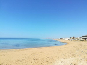 On the beach, Triscina